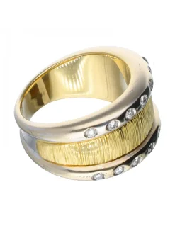 Anillo con brillantes oro blanco y amarillo 18kl