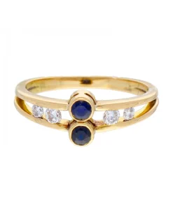 Anillo con cuatro brillantes y dos zafiros oro amarillo 18kl