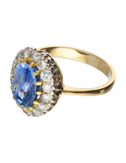 Anillo de oro 18 kl con diamantes y zafiro