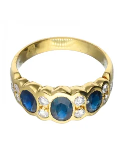 Anillo de oro 18 kl con diamantes y zafiros