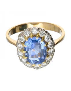 Anillo de oro 18 kl con diamantes y zafiro
