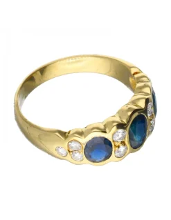 Anillo de oro 18 kl con diamantes y zafiros