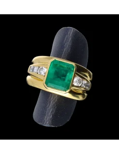 Anillo de oro 18 kl con esmeralda con diamantes