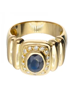 Anillo de oro 18 kl con zafiro y zirconita
