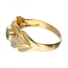 Anillo de oro 18 kl con zirconitas y esmeraldas