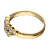 Anillo de oro amarillo 18 K con diseño y brillantes