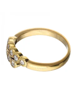 Anillo de oro amarillo 18 K con diseño y brillantes