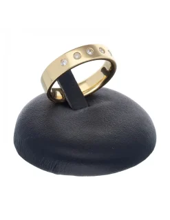 Anillo de oro amarillo 18 K con diseño y circonitas