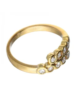 Anillo de oro amarillo 18 K con diseño y brillantes