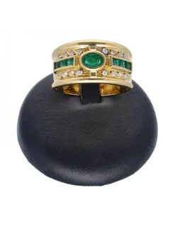 Anillo de oro amarillo 18 Kl con diseño y zircones y piedras sintéticas
