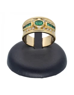Anillo de oro amarillo 18 Kl con diseño y zircones y piedras sintéticas