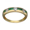 Anillo de Oro amarillo con diseño Aniversario, 6 Esmeraldas y 3 Circonitas