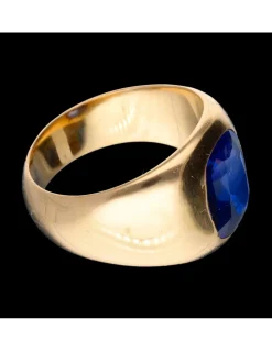 Anillo de oro amarillo con zafiro central
