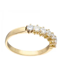 Anillo de oro amarillo 18K con diseño y brillantes
