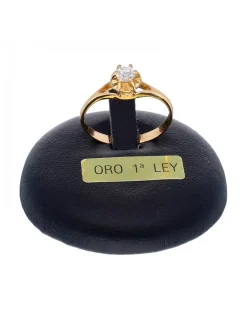 Anillo de oro amarillo 18K con diseño y brillante
