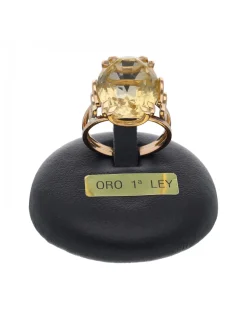 Anillo de oro amarillo 18K con diseño y circón