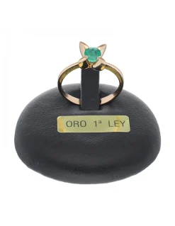 Anillo de oro amarillo 18K con diseño y piedras sintéticas