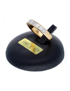 Anillo de oro amarillo 18K con diseño y brillantes