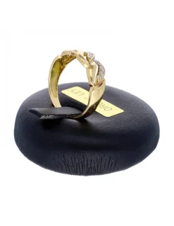 Anillo de oro amarillo 18K con diseño y circonitas