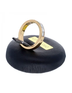 Anillo de oro amarillo 18K con diseño y brillantes