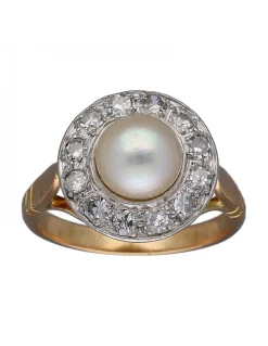 Anillo de Oro amarillo y blanco con diseño Coctel, Circonitas y Perla central
