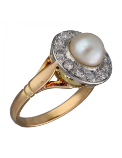 Anillo de Oro amarillo y blanco con diseño Coctel, Circonitas y Perla central