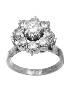 Anillo de oro blanco 18 Kl con diseño y brillantes circundantes