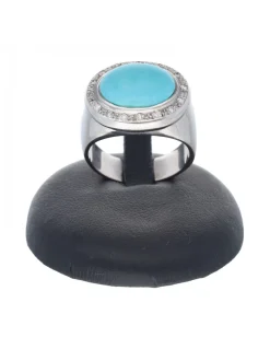Anillo de oro blanco 18 Kl con diseño circonitas y turquesa