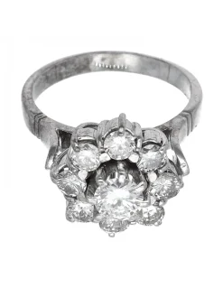 Anillo de oro blanco 18 Kl con diseño y brillantes circundantes