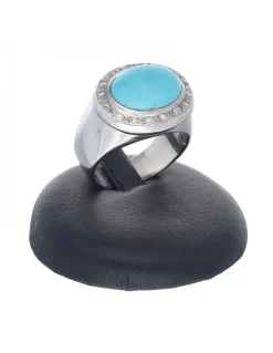 Anillo de oro blanco 18 Kl con diseño circonitas y turquesa