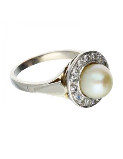 Anillo de oro blanco 18 kl moissante y perla
