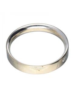 Anillo de oro blanco 18 Kl con diseño y brillante