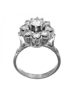 Anillo de oro blanco 18 Kl con diseño y brillantes circundantes