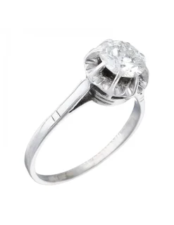 Anillo de oro blanco 18K con diseño y brillante