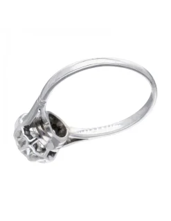 Anillo de oro blanco 18K con diseño y brillante