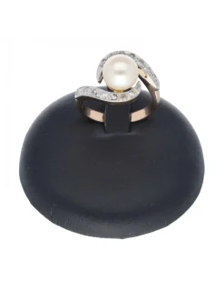 Anillo de oro rosado 18 Kl con diseño brillantes y perla
