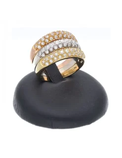 Anillo de tres oros 18 K con diseño y circonitas