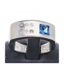 Anillo Oro blanco 18 K con diseño y zircones circundantes