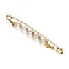 Colgante aguja de oro amarillo 18K con perlas sintéticas