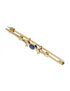 Colgante aguja de oro amarillo 18K con zafiro y brillantes