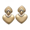 Pendientes de Oro amarillo y Blanco 18K con diseño de corazones