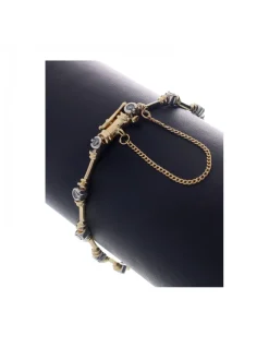 Pulsera de oro amarillo 18 K con diseño y brillantes