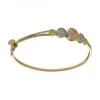 Pulsera de oro amarillo 18K con diseño rígido y circonitas