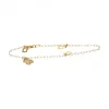 Pulsera de oro amarillo 18K con diseño oso TOUS