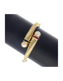 Pulsera de oro amarillo 18K con diseño zafiros rubíes y perlas
