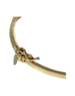Pulsera de oro amarillo 18K con diseño rígido y circonitas