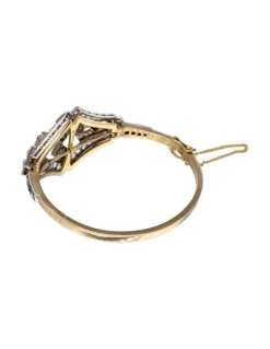 Pulsera de oro amarillo y blanco 18K con diseño y brillantes