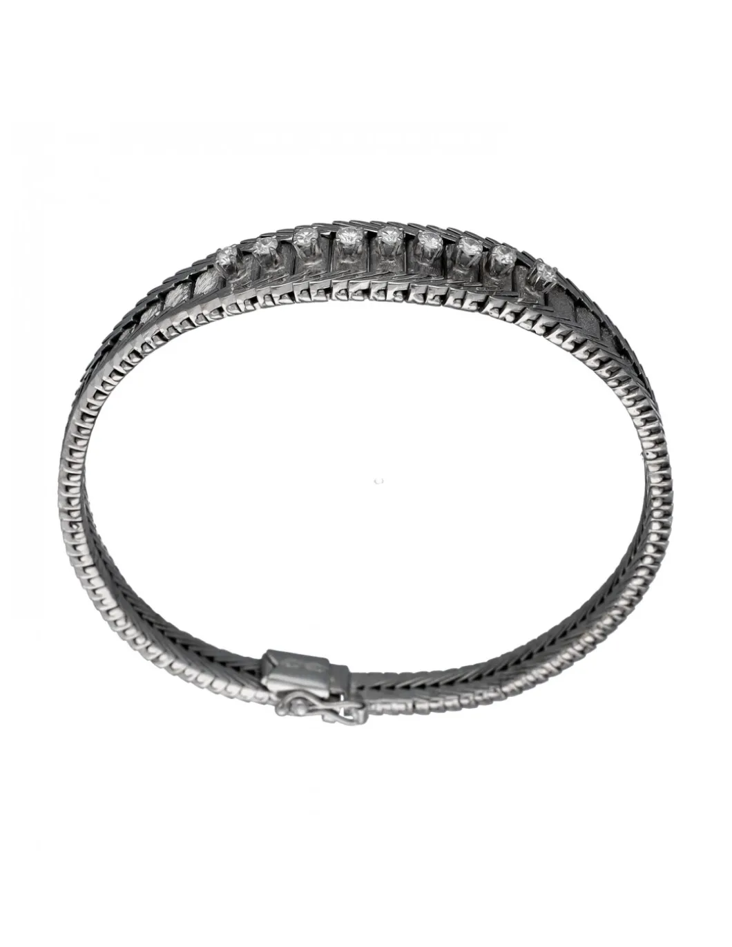 Pulsera de Oro blanco con diseño semirrígido y nueve Brillantes