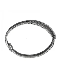 Pulsera de Oro blanco con diseño semirrígido y nueve Brillantes