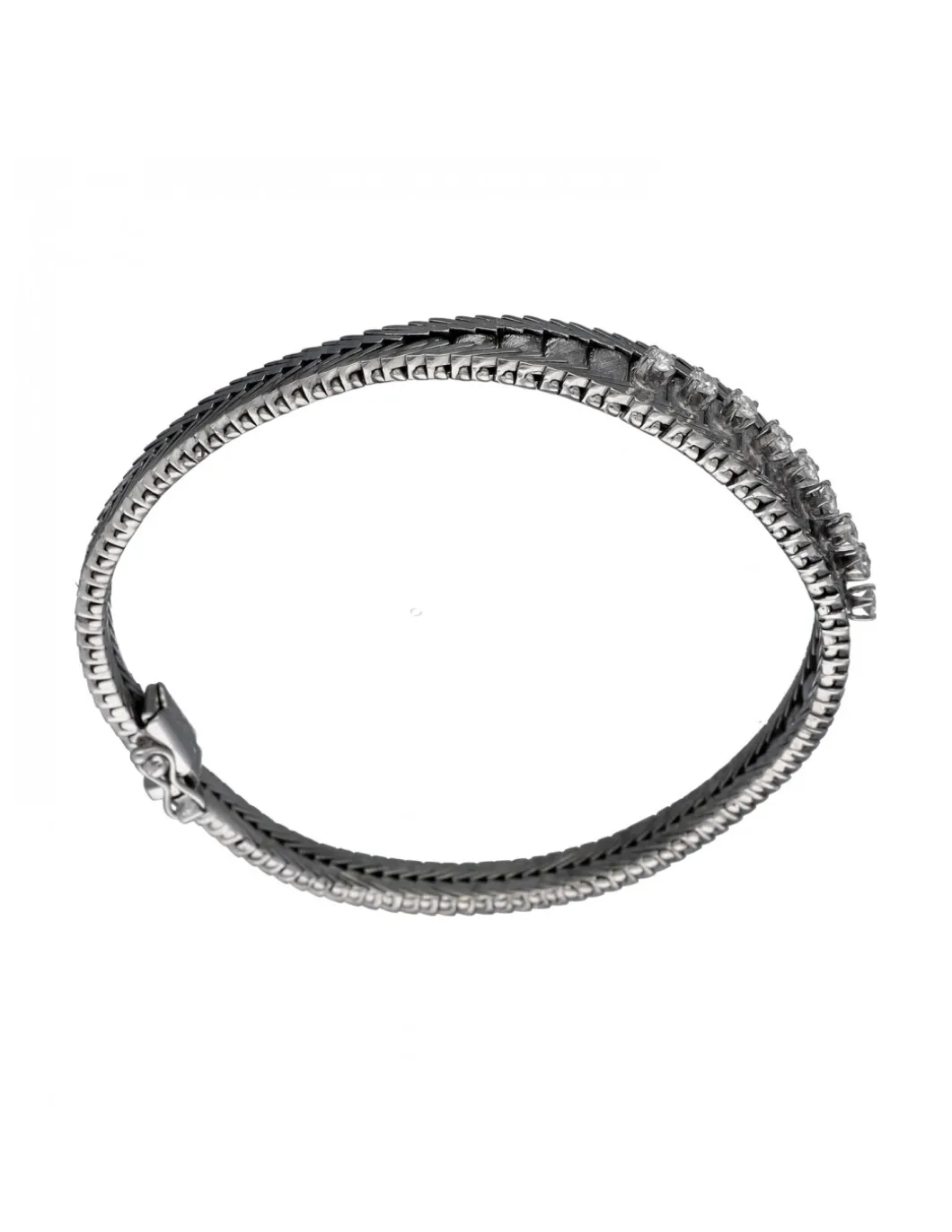Pulsera de Oro blanco con diseño semirrígido y nueve Brillantes